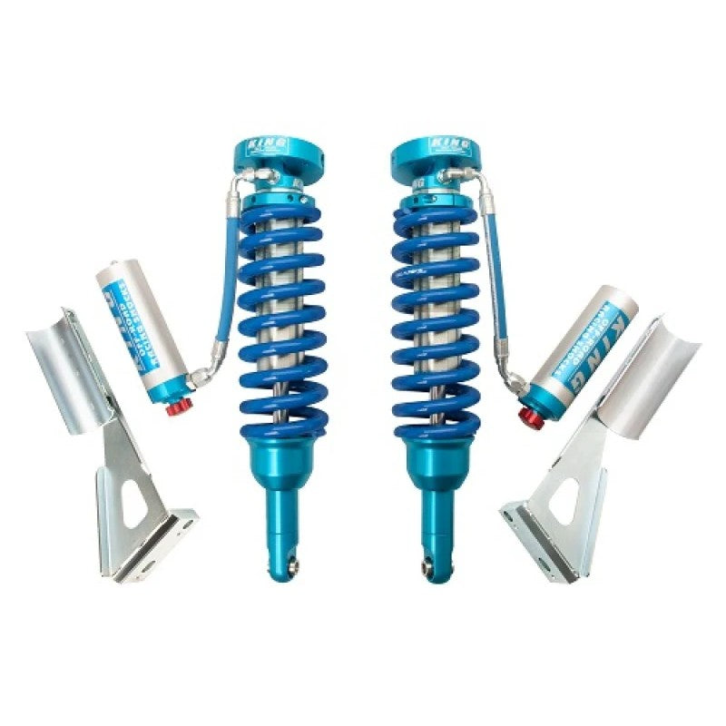 King Shocks 2.5-inch front remote reservoir coilovers with blue compression adjusters for 2005-2023 Toyota Tacoma.