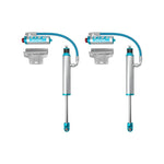 Pair of King 2.5 inch diameter blue rear remote reservoir shocks with compression adjusters for Toyota Tacoma.