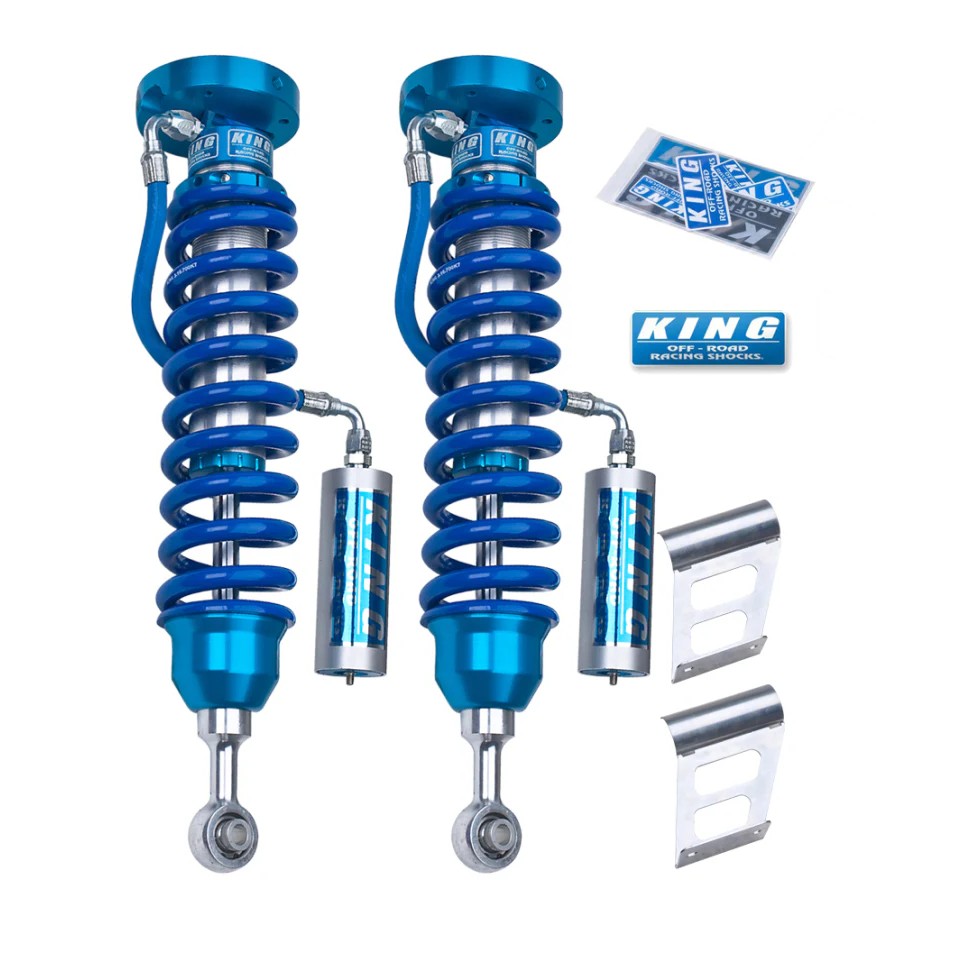 Pair of King Shocks 2.5-inch front coilovers with remote reservoirs and blue coil springs for 2007-2017 Toyota Tundra.