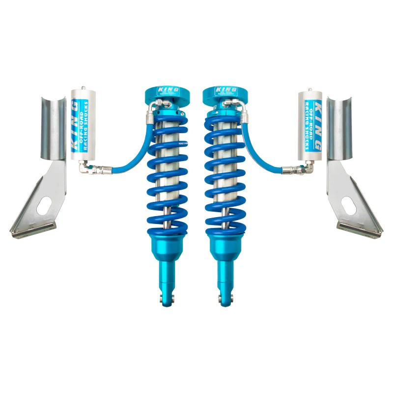Pair of King Shocks 2.5-inch front coilovers with blue remote reservoirs and silver springs.