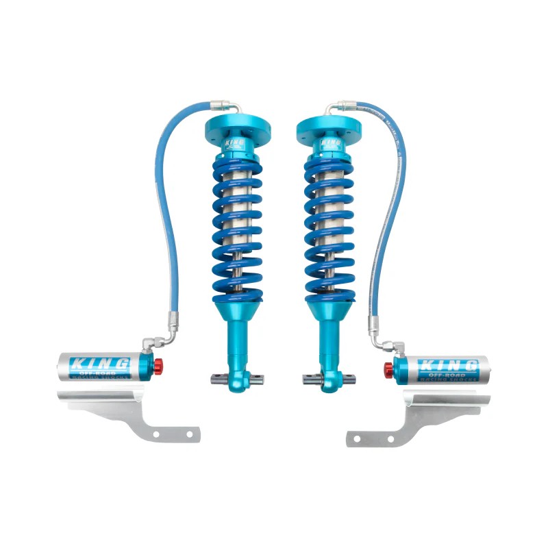 Pair of King Shocks blue and silver 2.5 remote reservoir front coilovers with compression adjusters for Ford F-150 2WD.
