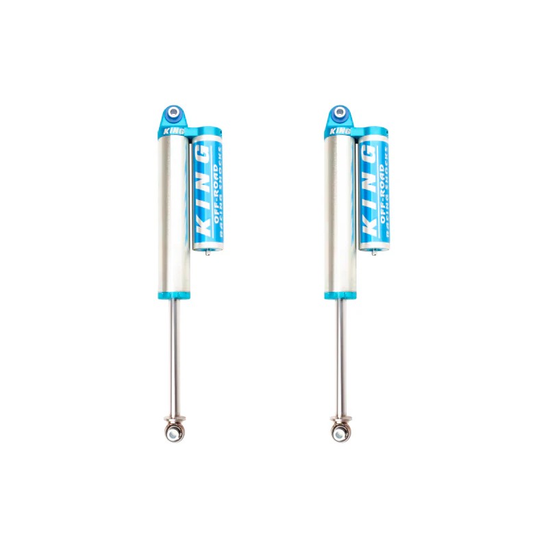 Pair of blue and silver King Shocks 2.5 rear shocks with integrated piggyback reservoirs for Colorado and Canyon trucks.