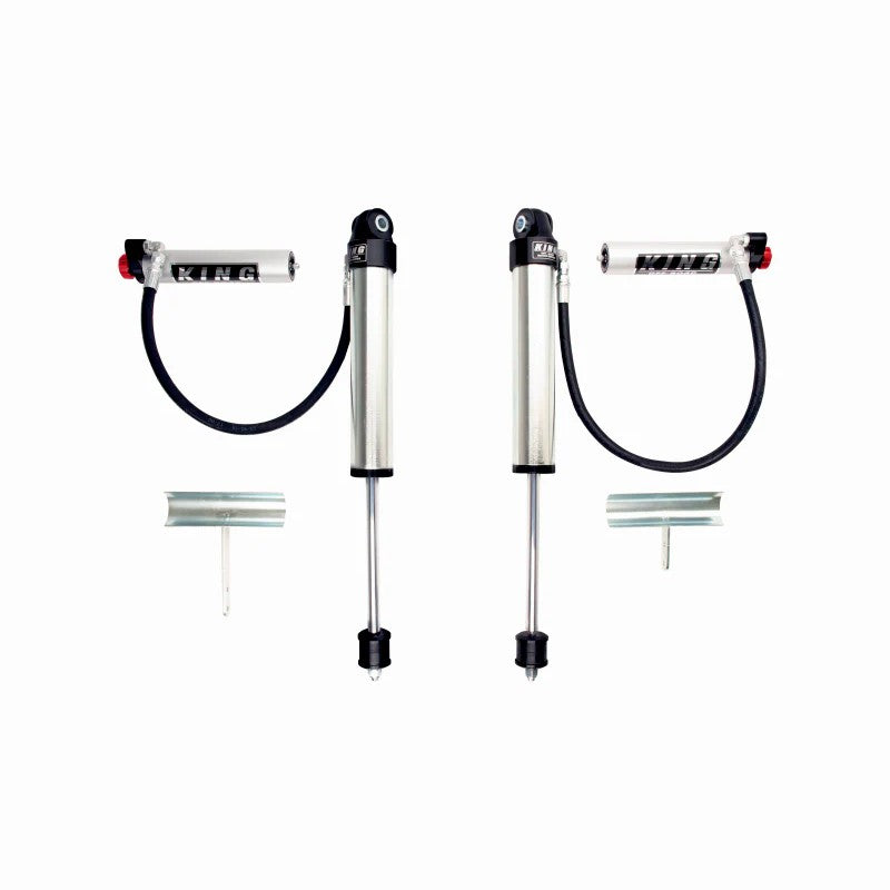 Pair of King Shocks 2.5-inch front remote reservoir shocks with blue anodized hardware and compression adjusters.