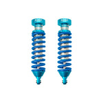 King Shocks 2.5-inch internal reservoir front coilovers with blue coil springs for 1996-2004 Toyota Tacoma.