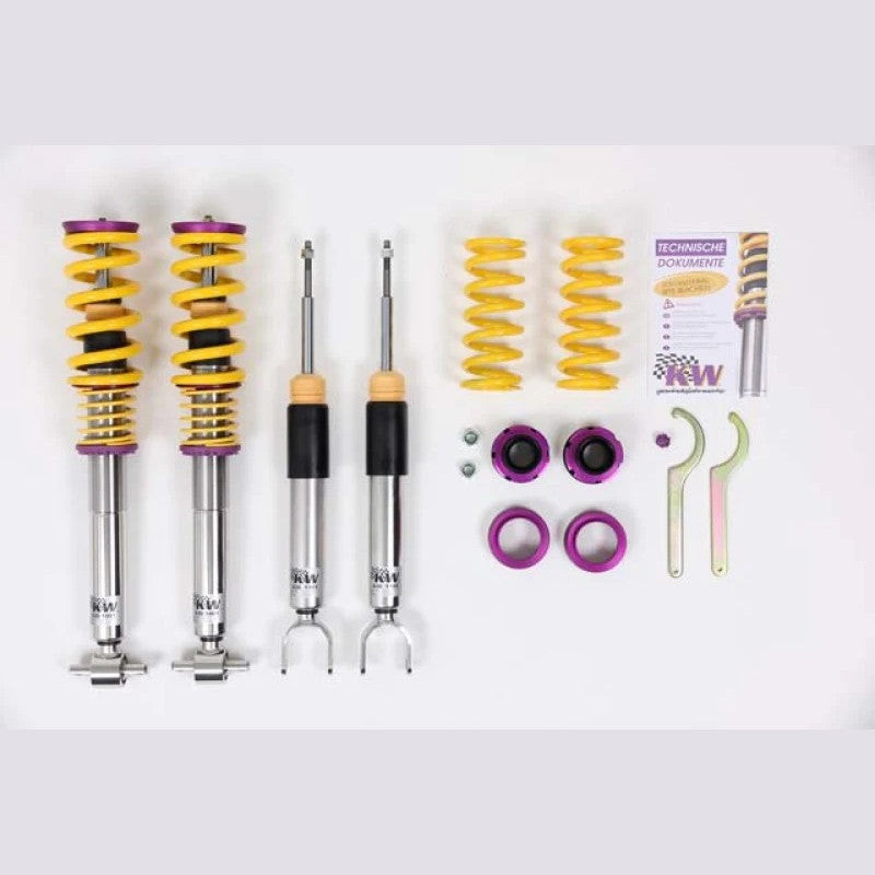 KW V3 stainless steel coilover struts with yellow springs and purple composite perches for Cadillac CTS.