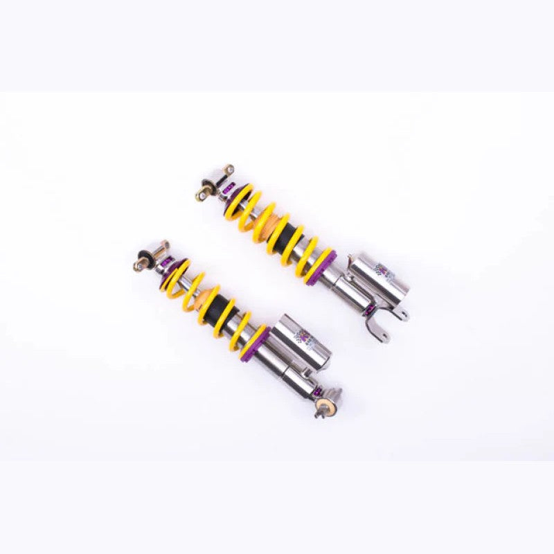 KW V3 inox-line stainless steel coilover assemblies with purple springs and yellow adjustment dials for Corvette C7.
