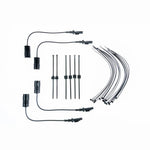 KW Electronic Damping Cancellation Kit modules with factory-style connectors for Chevrolet Camaro and Ford Mustang.