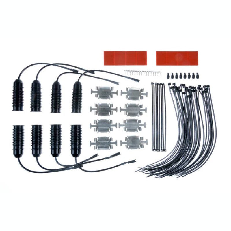 KW Electronic Damping Cancellation Kit modules and harness connectors for BMW F10 5 Series and 7 Series.
