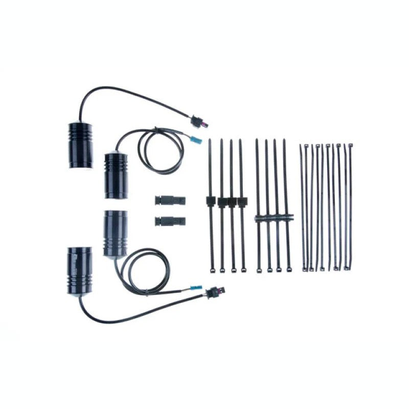 KW electronic damping cancellation modules with factory-style connectors for BMW M5 and M6.