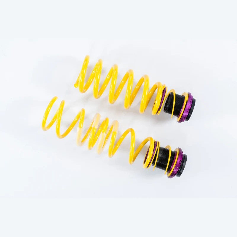 KW H.A.S. height adjustable lowering spring kit featuring yellow springs and purple threaded adjusters for BMW M5 F90.
