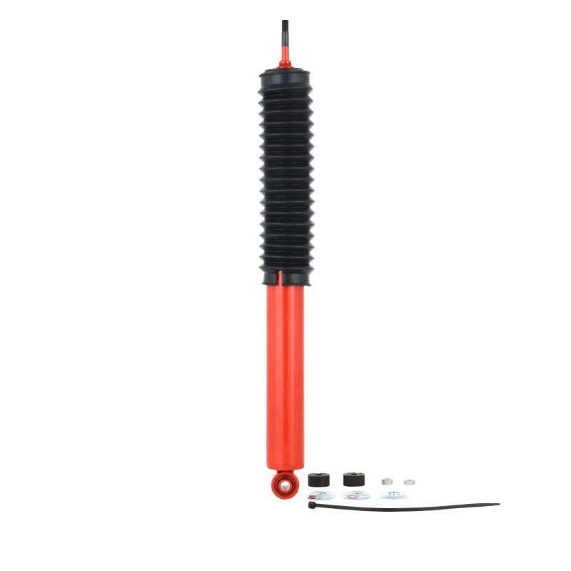 Red KYB MonoMax heavy-duty monotube rear gas shock absorber for Toyota Tacoma trucks.