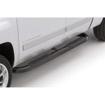 Lund 4 inch oval curved black steel nerf bars with non-slip rubber step pads for Chevrolet Silverado and GMC Sierra.