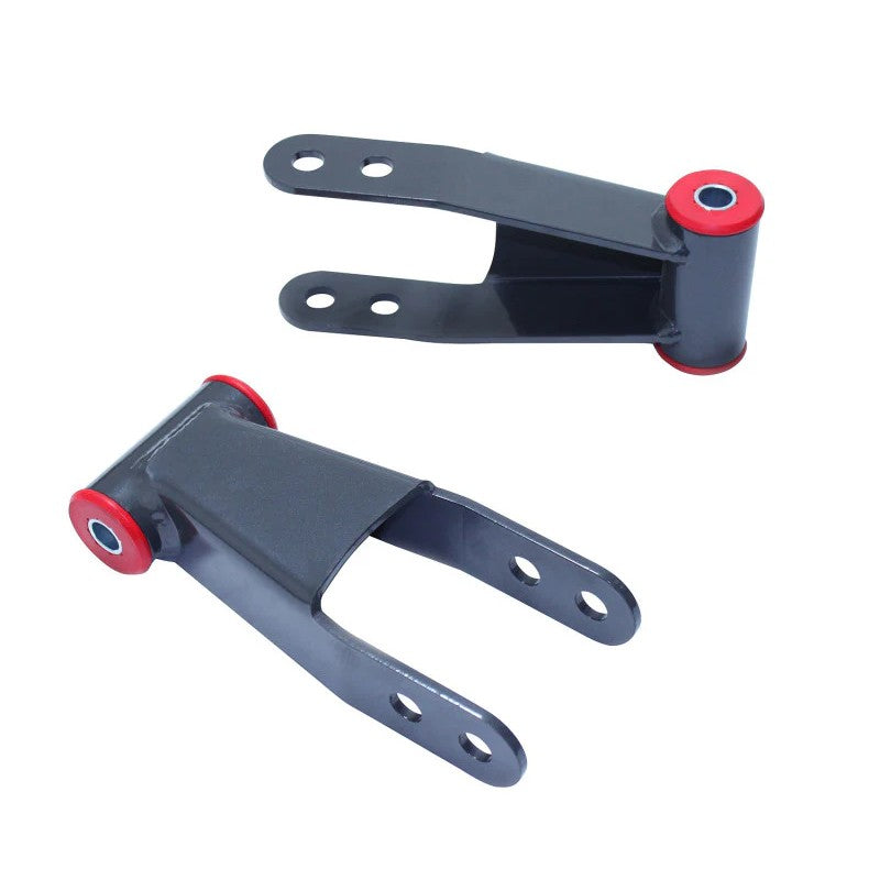 MaxTrac 712120 pair of grey powder-coated 2-inch steel rear lift shackles with urethane bushings.
