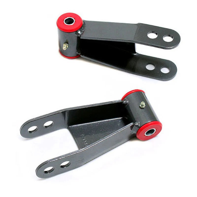MaxTrac grey powder-coated 2-inch rear lowering shackles with greasable bushings and zerk fittings for Nissan Titan.