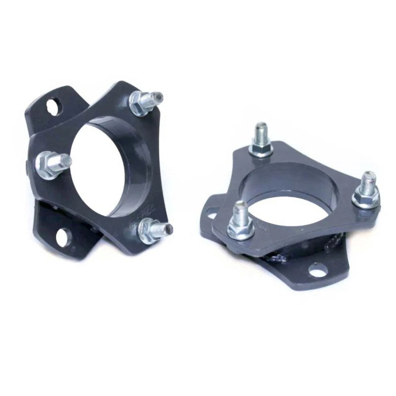 Pair of MaxTrac 2.5-inch grey powder coated front leveling strut spacers with mounting studs and hardware.