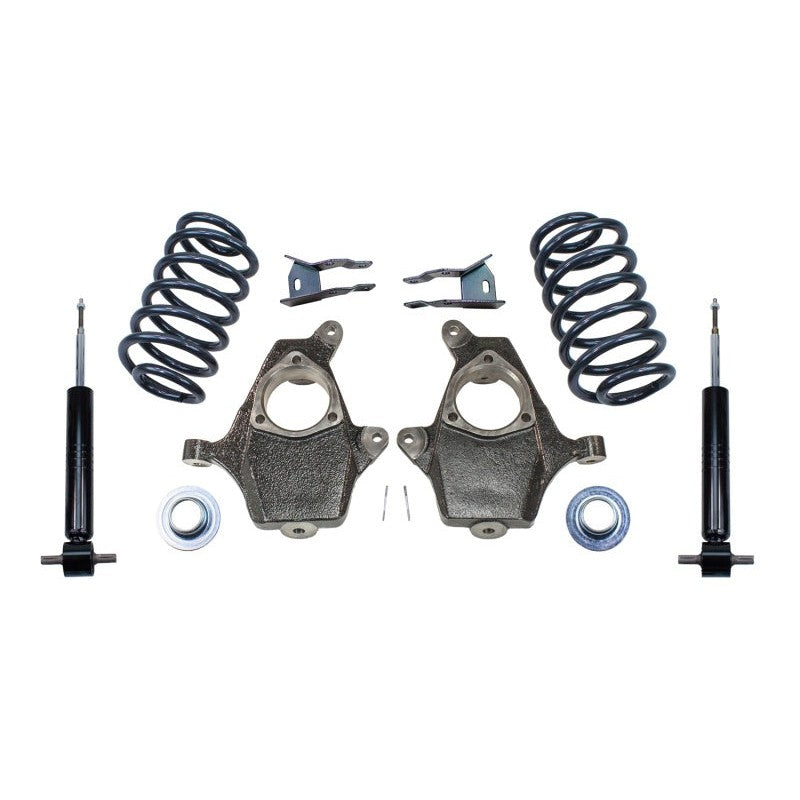 MaxTrac 3-inch/4-inch lowering kit featuring spindles, adjustable struts, rear coils, and shock extenders for GM SUVs.