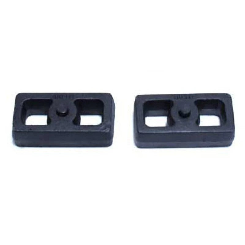 Pair of MaxTrac 1-inch black cast iron rear lift blocks for truck suspension lift and leveling.