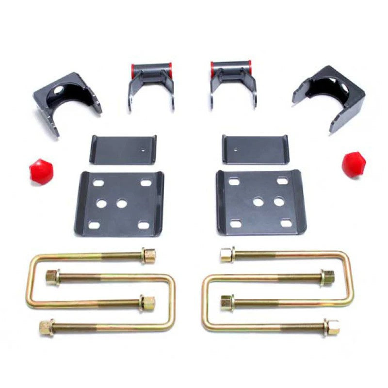 MaxTrac 5-inch rear lowering flip kit hardware including axle relocators, spring plates, U-bolts, and greaseable shackles.