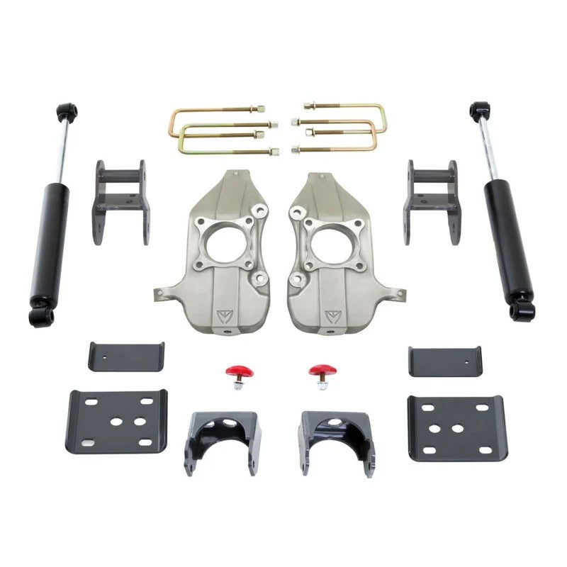 MaxTrac MaxPro lowering kit components featuring forged aluminum spindles, rear flip kit hardware, and twin-tube shocks.