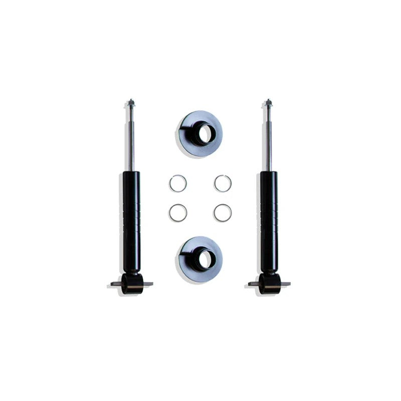 Pair of black MaxTrac adjustable front lowering struts with silver coil seats and retainer hardware for Ford F-150.