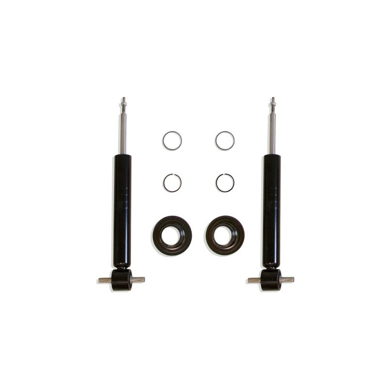 Black MaxTrac 0-3 inch front adjustable lowering struts with included coil seats and retainer clips.
