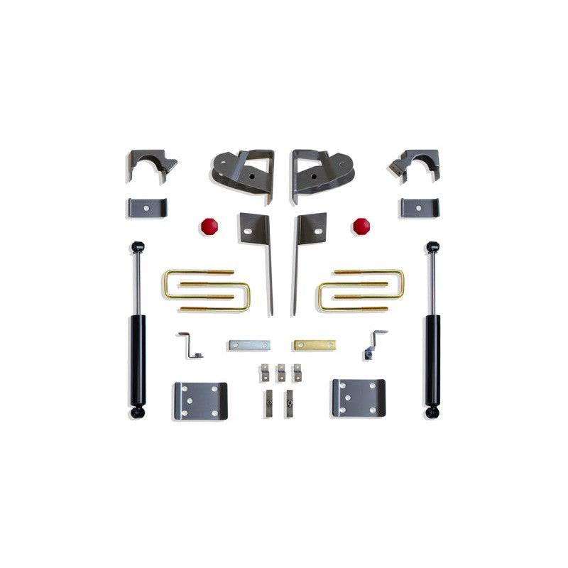 MaxTrac 5-inch rear lowering flip kit components including axle saddles, hangers, bump stops, and two shocks for GM 1500.