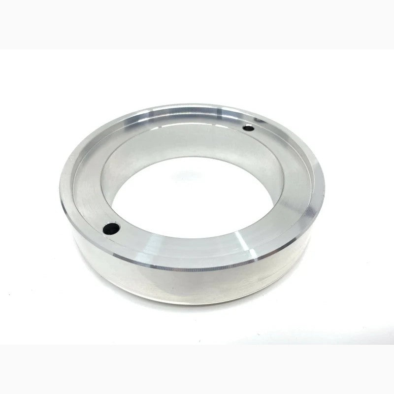 Machined aluminum 2-hole hydraulic throwout bearing spacer, 0.950 inches thick, for T56 transmission.