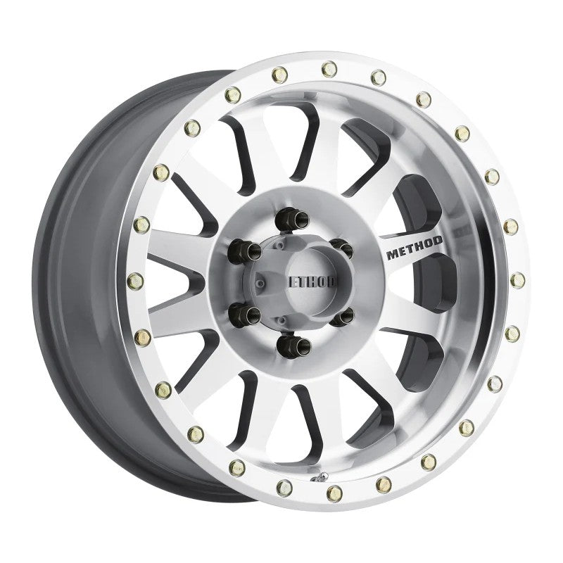 Method MR304 Double Standard 17x8.5 machined 12-spoke wheel with simulated beadlock lip and push-through center cap.