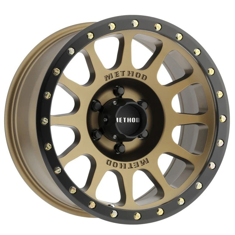 Method MR305 NV 18x9 wheel in bronze with black simulated beadlock lip and 12-window design