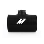 Mishimoto 2.5 inch black 4-ply silicone coupler with an integrated 1/8 inch NPT aluminum sensor bung