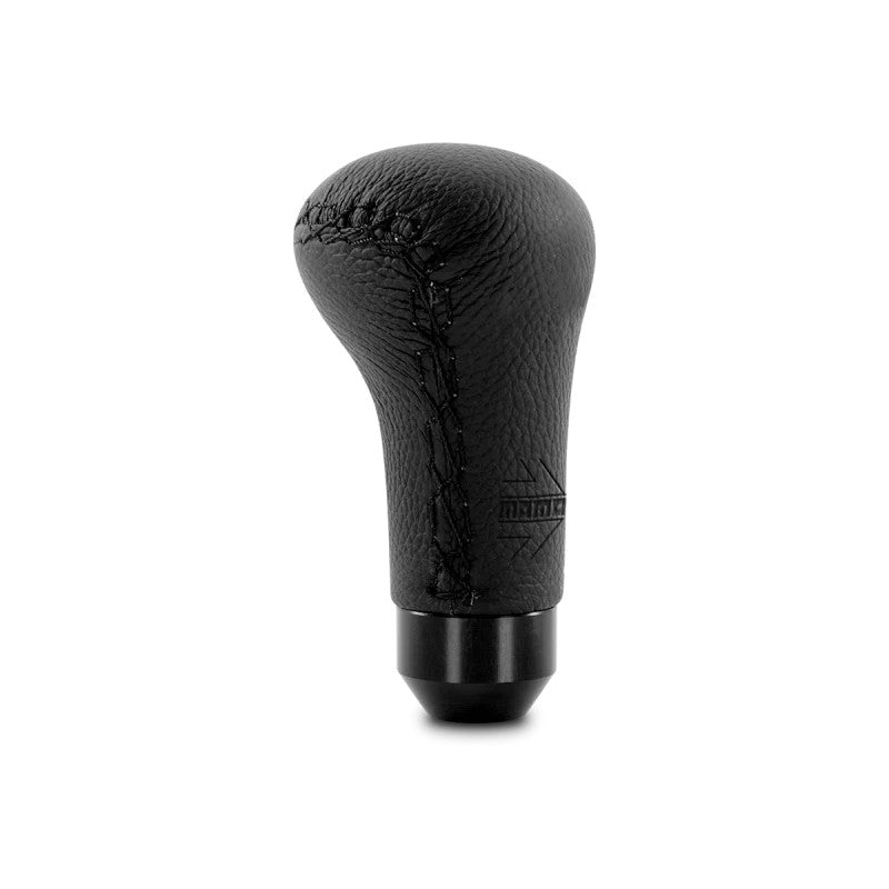 Momo Anatomico shift knob featuring black leather wrap with black stitching and ergonomic contours.
