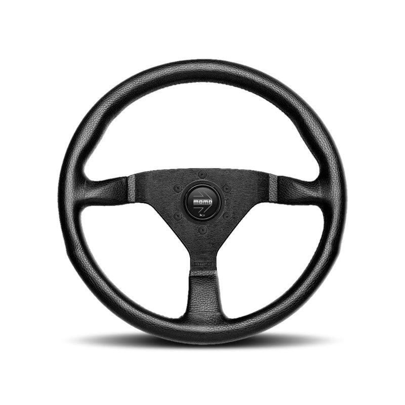 Momo Montecarlo 320mm performance steering wheel featuring black leather, black stitching, and black three-spoke center.