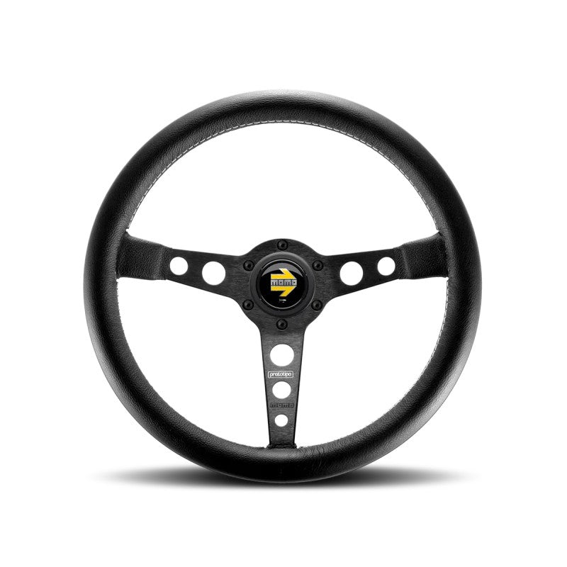 Momo Prototipo 350mm steering wheel featuring black leather, white stitching, and black three-hole spokes.