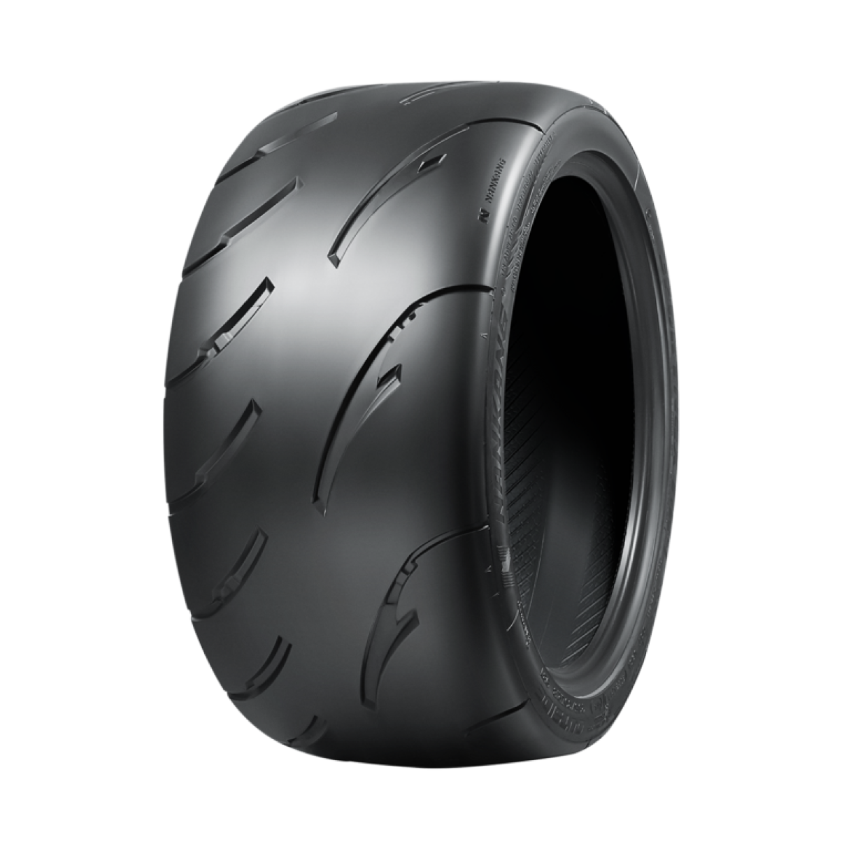 Nankang AR-1 V2 semi-slick tire showing the specialized track tread pattern and high-performance sidewall markings.