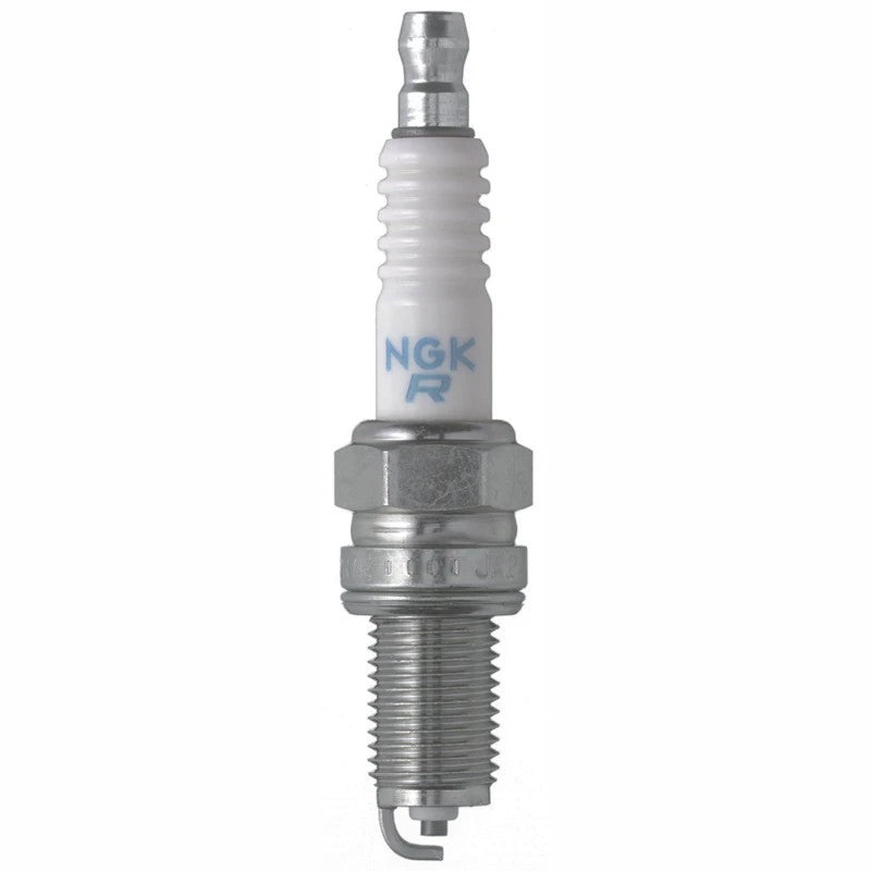 Set of four NGK DCPR8E Standard spark plugs with yellow packaging, copper core, and nickel alloy tip
