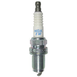 Four NGK IZFR6K-11 Laser Iridium spark plugs with fine-wire iridium tips and ribbed ceramic insulators.