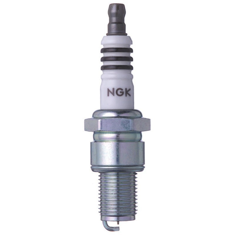 Four NGK Iridium IX BR9EIX spark plugs with solid top terminals and blue branding on the ceramic insulator.