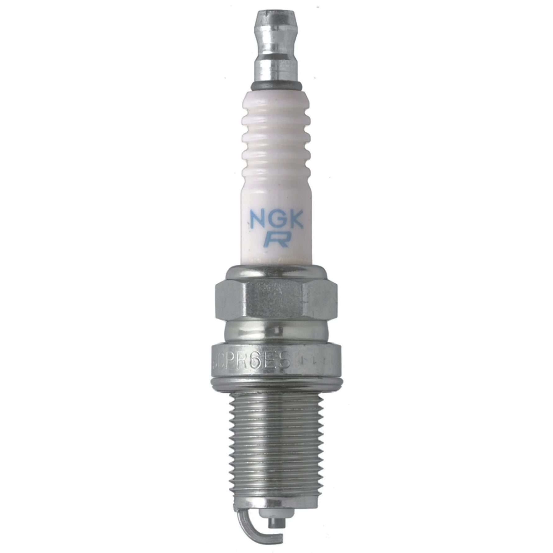 Box of 4 NGK BCPR7ES standard nickel alloy spark plugs with copper cores and white alumina silicate ceramic insulators.