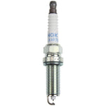 NGK Laser Iridium High Ignitability spark plug DILKAR7Q8 showing the iridium center electrode and ceramic insulator