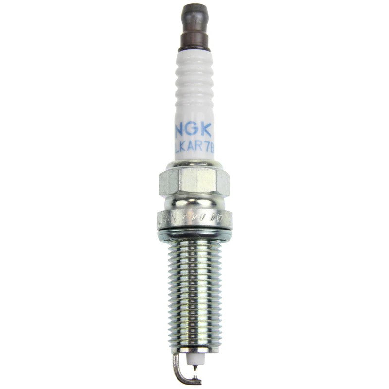 NGK Laser Iridium High Ignitability spark plug DILKAR7Q8 showing the iridium center electrode and ceramic insulator