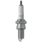 NGK Laser Iridium IJR7A9 spark plug set showing the fine-wire iridium center electrode and ceramic insulator.