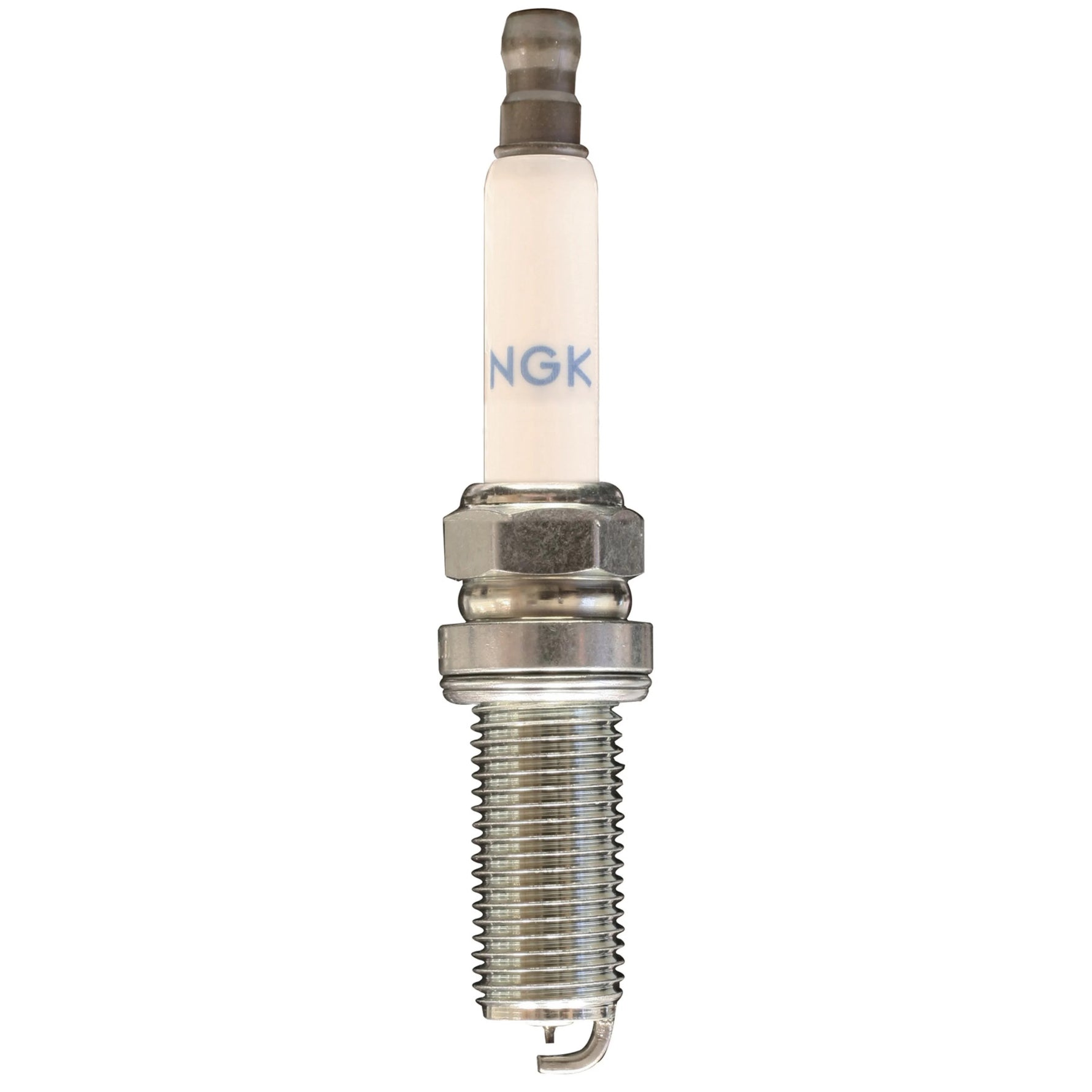 A set of four NGK Laser Iridium spark plugs with trivalent metal plating and iridium-tipped electrodes.