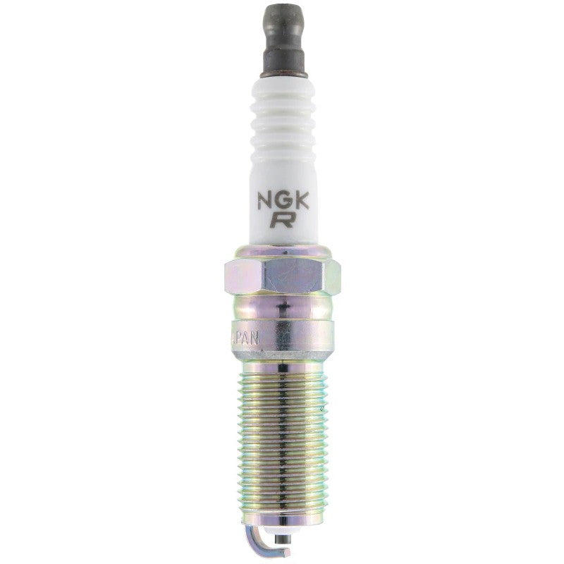 NGK R7448A-9 Racing spark plug showing the electrode, ceramic insulator, and trivalent metal plated threads.