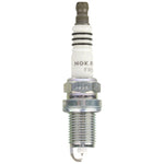 Set of four NGK Ruthenium HX high-ignitability spark plugs showing the 0.4mm fine wire center electrode.