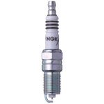 Set of four NGK Iridium IX TR8IX spark plugs showing the fine wire iridium tip and tapered ground electrode.