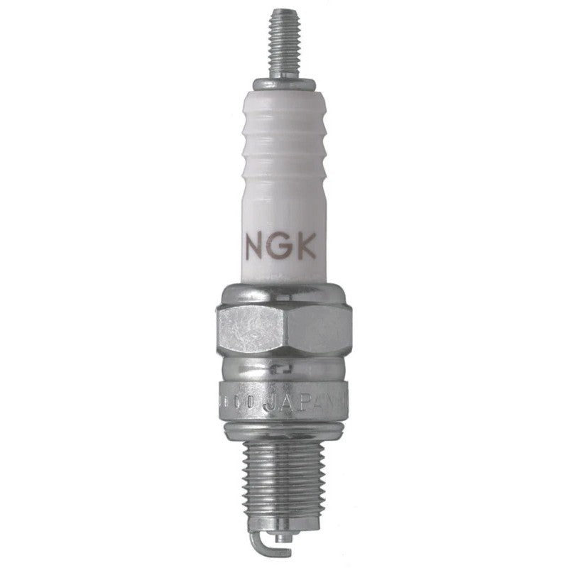 Set of four NGK C7HSA standard spark plugs with white ceramic insulators and nickel-plated shells.