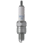 Set of 4 NGK CR7HS standard spark plugs with nickel alloy electrodes and white ceramic insulators.