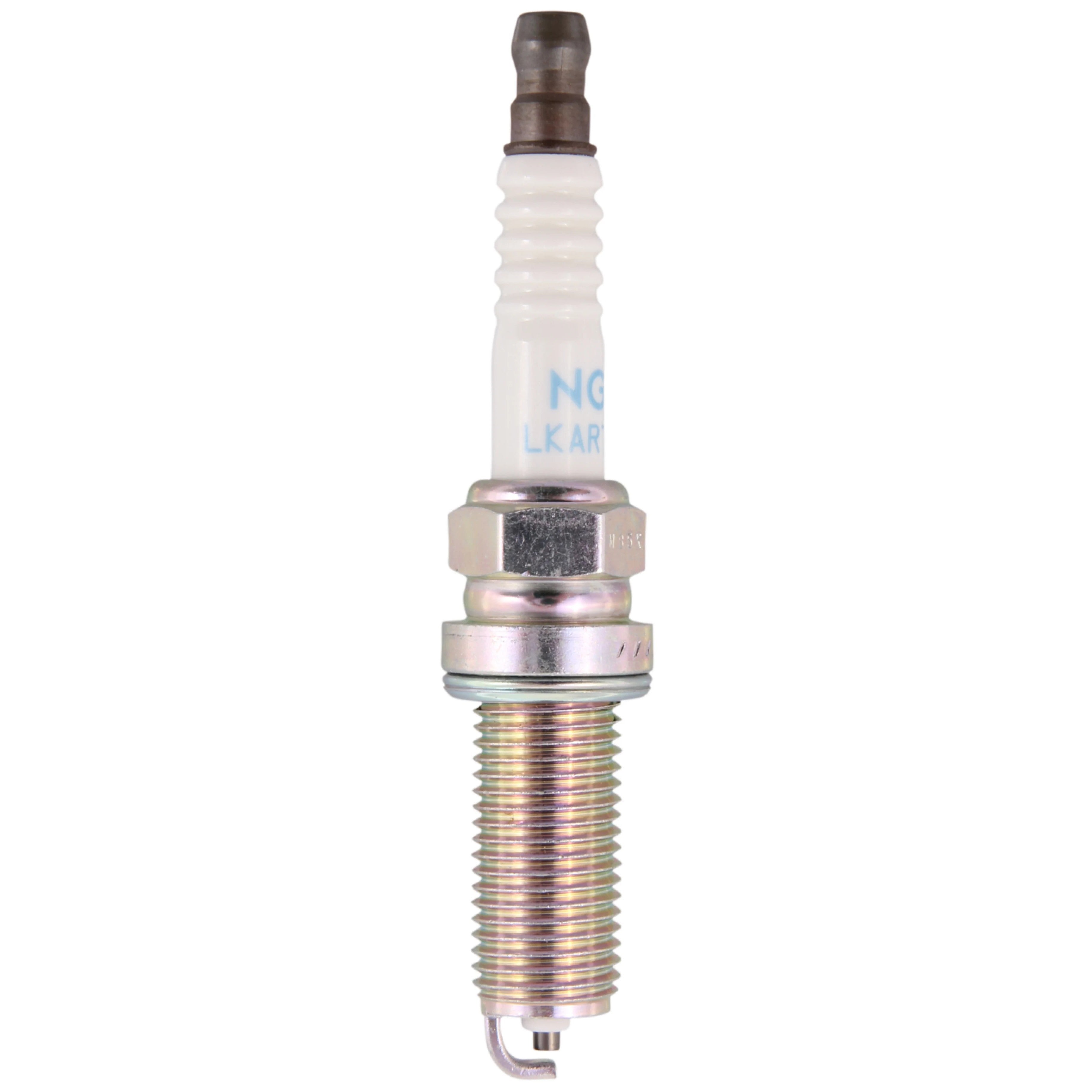 Four NGK Standard LKAR7C-9 spark plugs showing the white ceramic insulator and nickel-plated metal shell.
