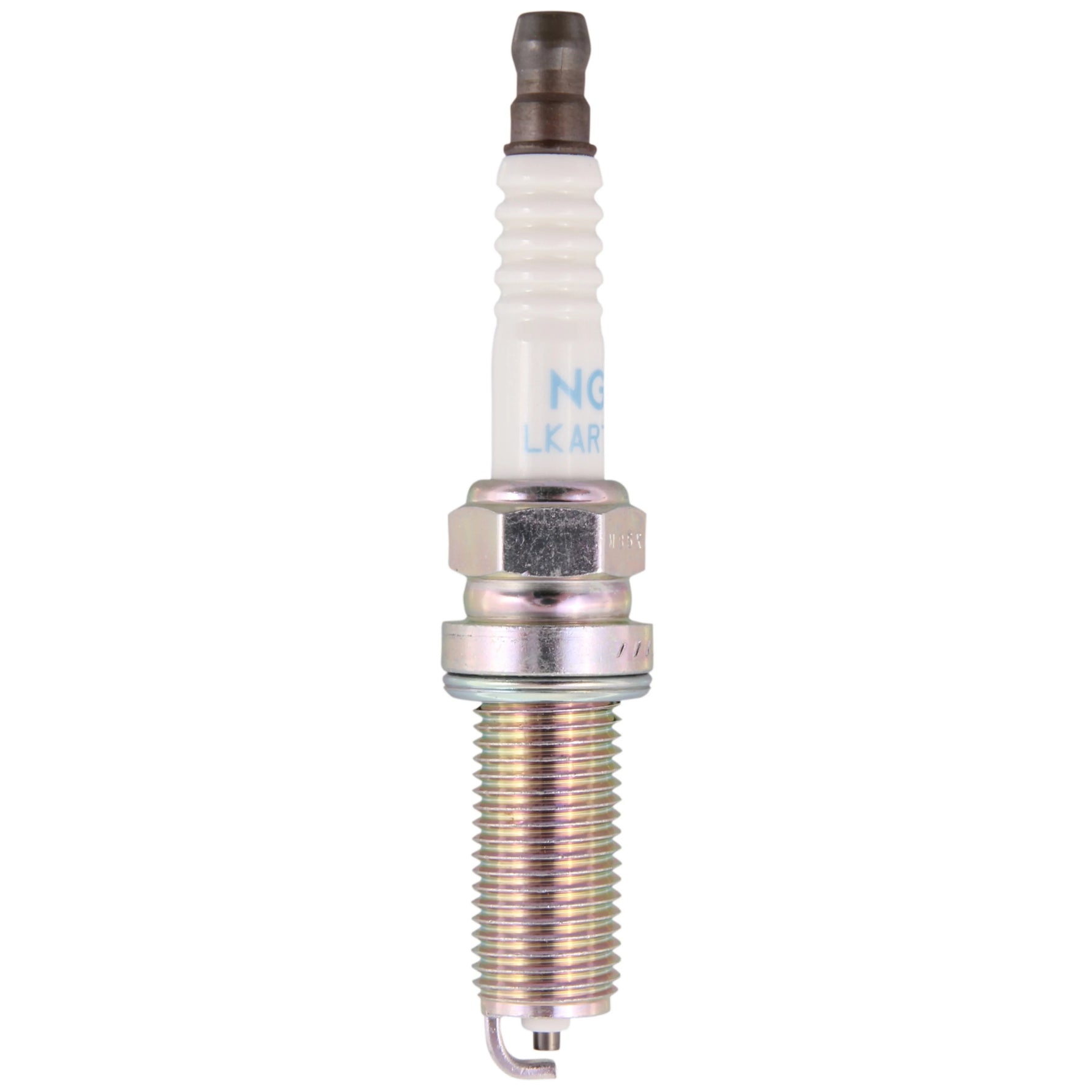 Four NGK Standard LKAR7C-9 spark plugs showing the white ceramic insulator and nickel-plated metal shell.