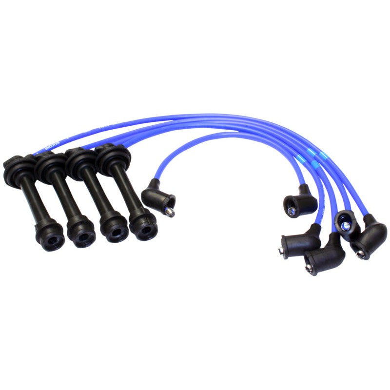 NGK 9338 ignition wire set featuring blue cables and black silicone boots for 1985-1987 Toyota Corolla Sport GTS.